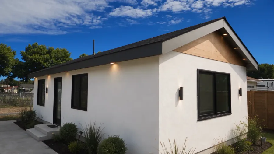 Rendering of a detached ADU with a private entrance and its own lighting